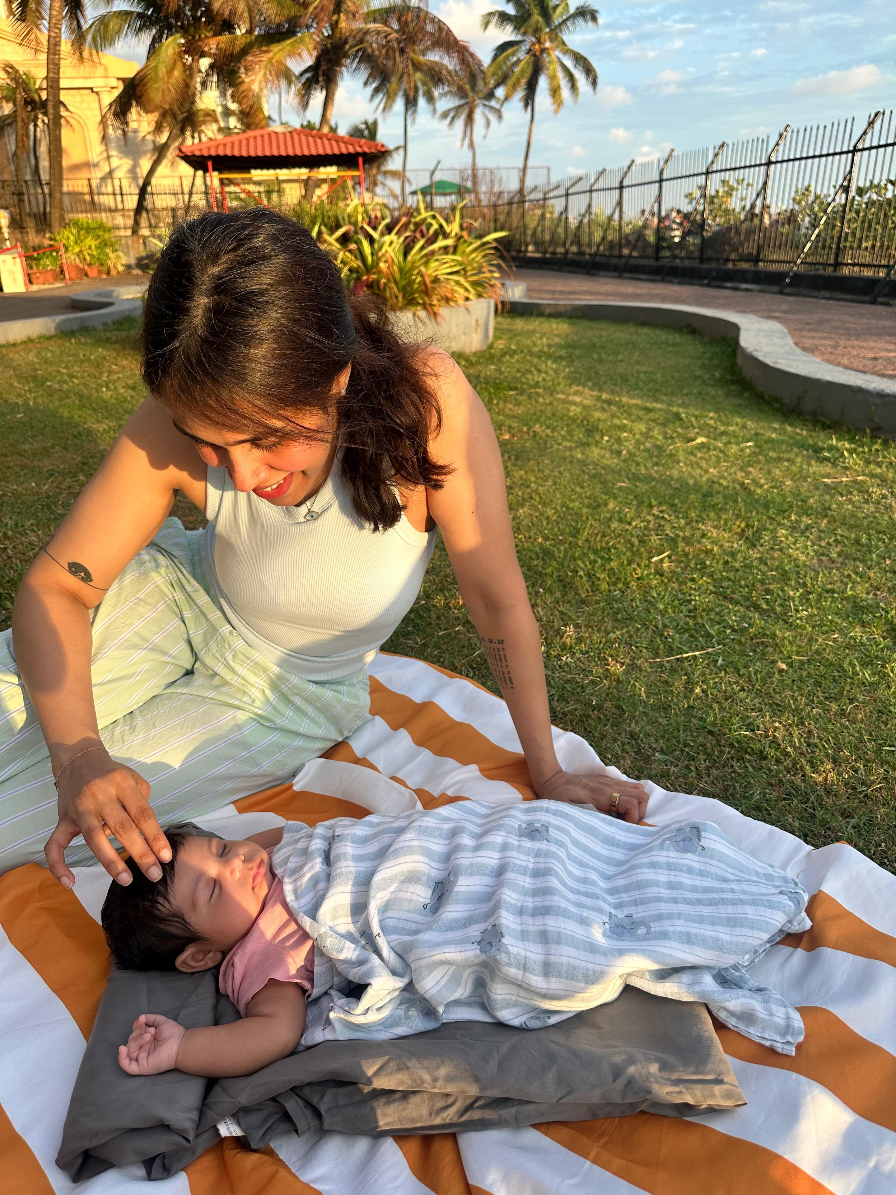 First time on the grass. Mumma watching over every second.